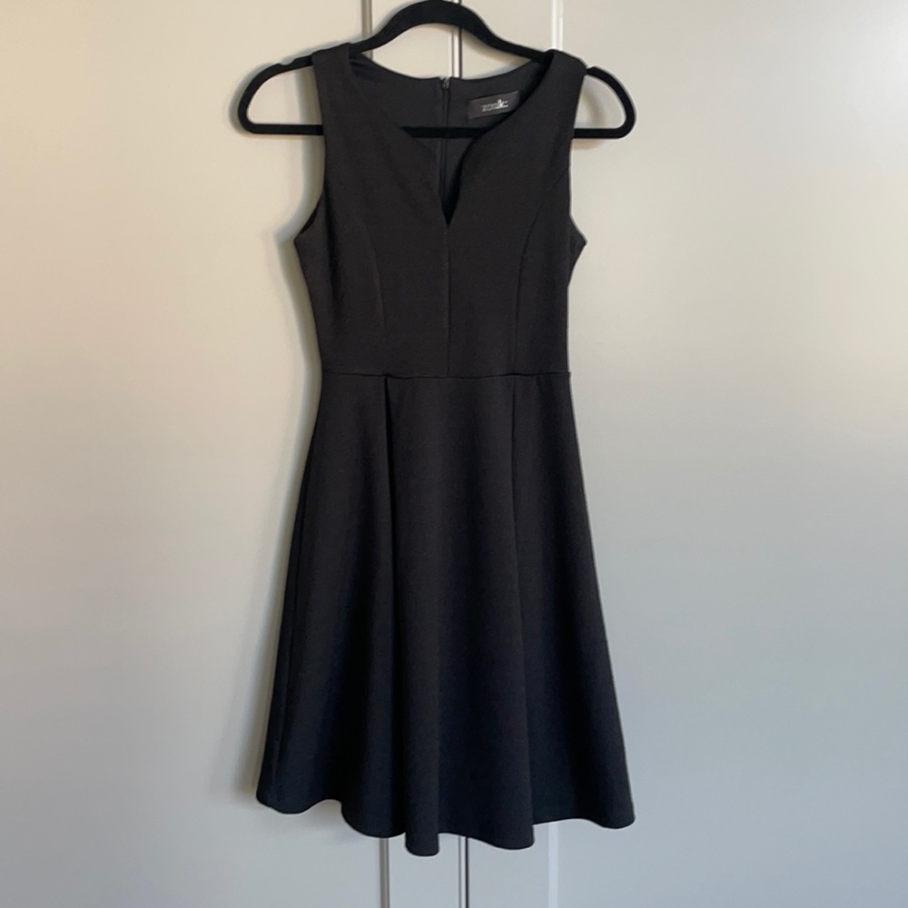 Stretchy waist hugging LBD with flared skirt, great for holiday parties